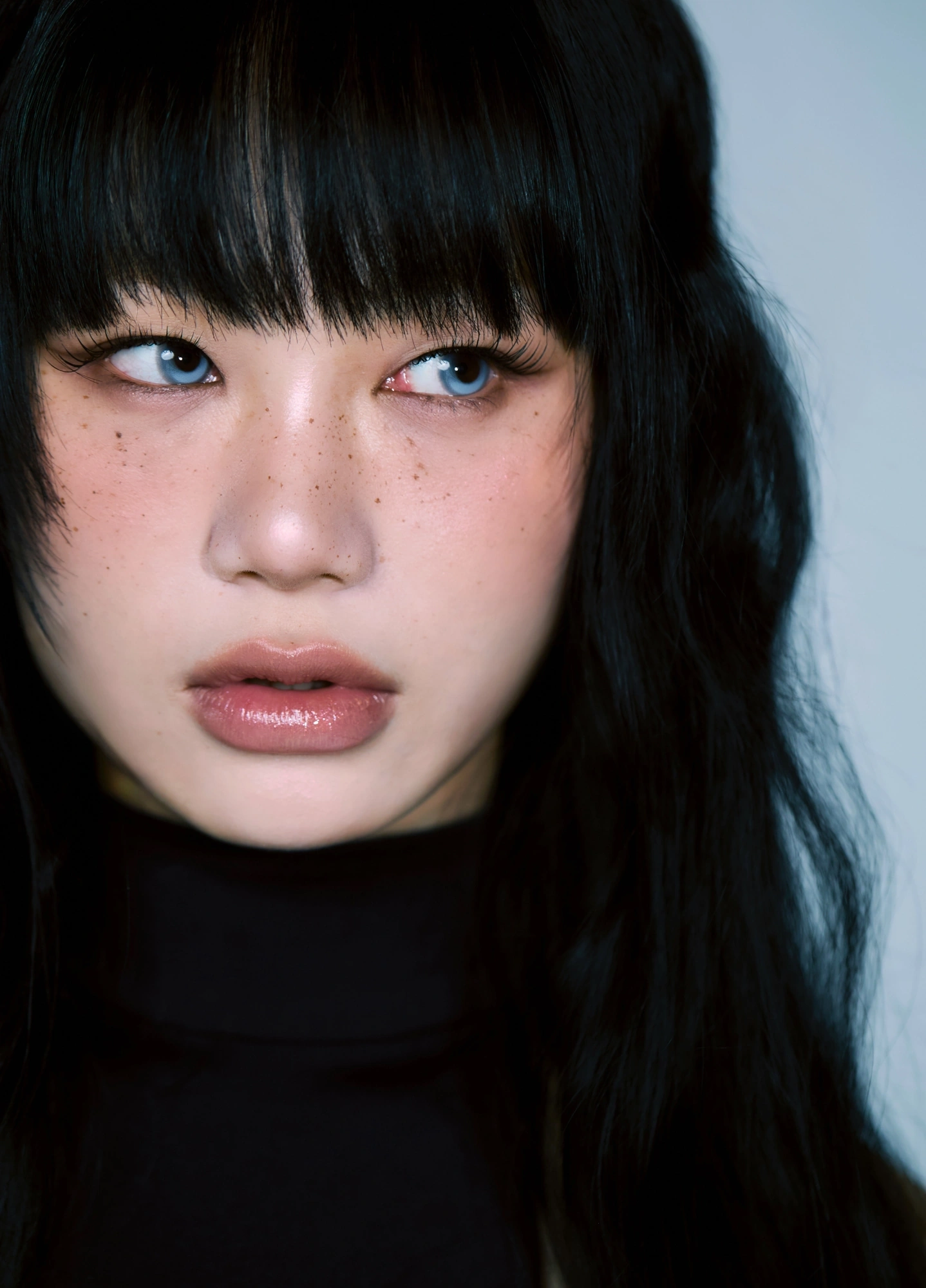 A close-up portrait in soft natural light