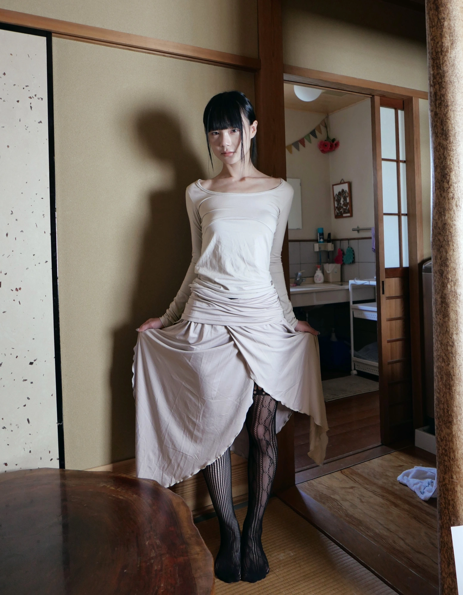 A white dress in a warm wooden room